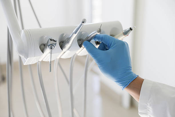 Professional Tooth Extraction technician working in Rising Sun, IN
